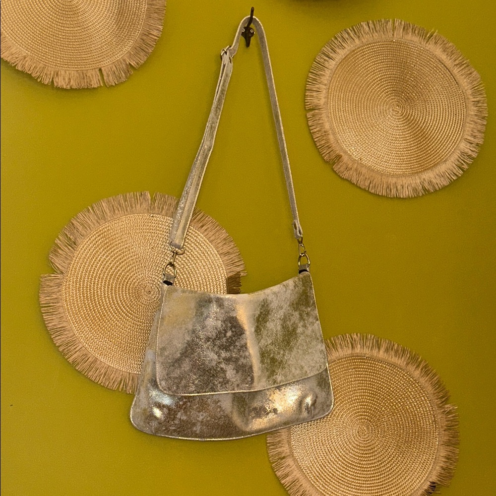 Cofi gold leather messenger bag.